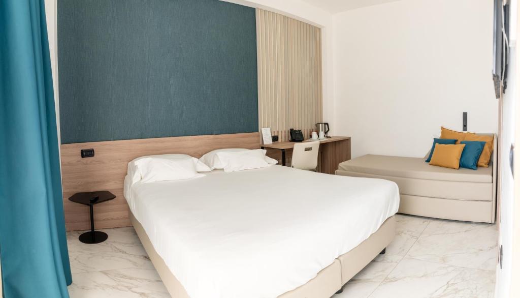 Postel nebo postele na pokoji v ubytování Hotel Maiuri Pompei