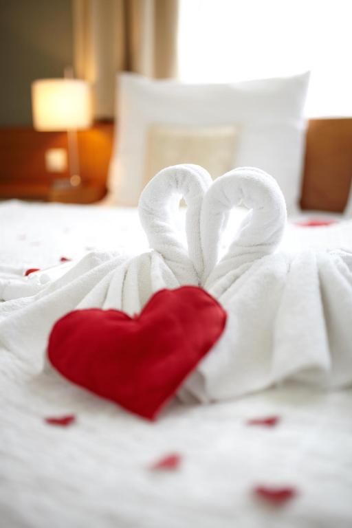 Postel nebo postele na pokoji v ubytování Hotel Radun
