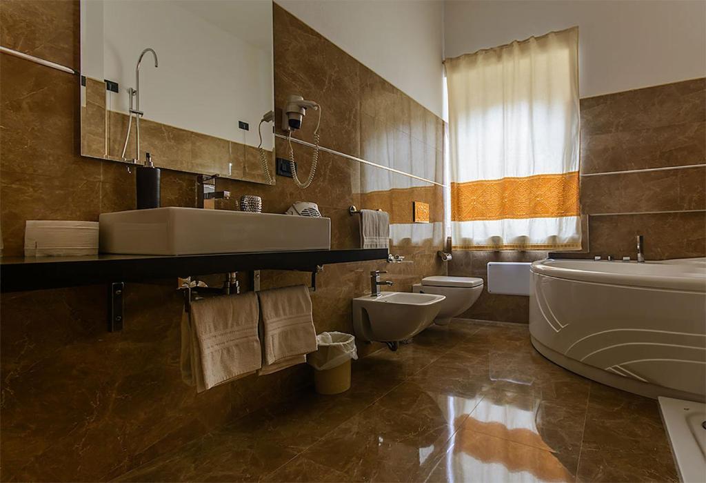 Koupelna v ubytování Hotel Del Corso
