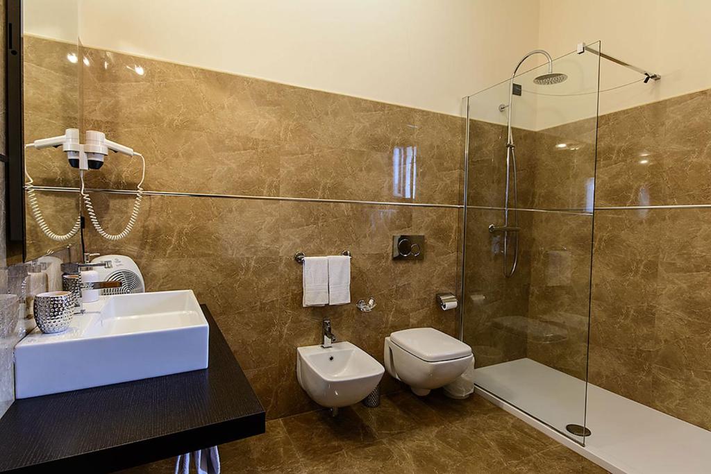 Koupelna v ubytování Hotel Del Corso