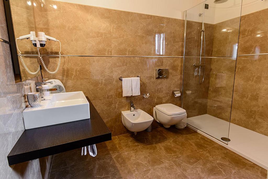 Koupelna v ubytování Hotel Del Corso