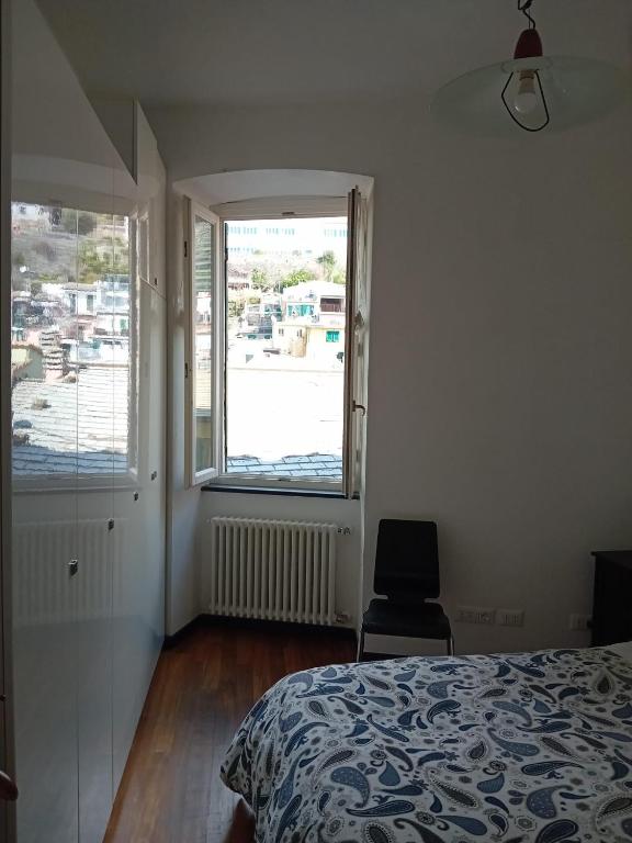 Postel nebo postele na pokoji v ubytování La Scala Vernazza CinqueTerre