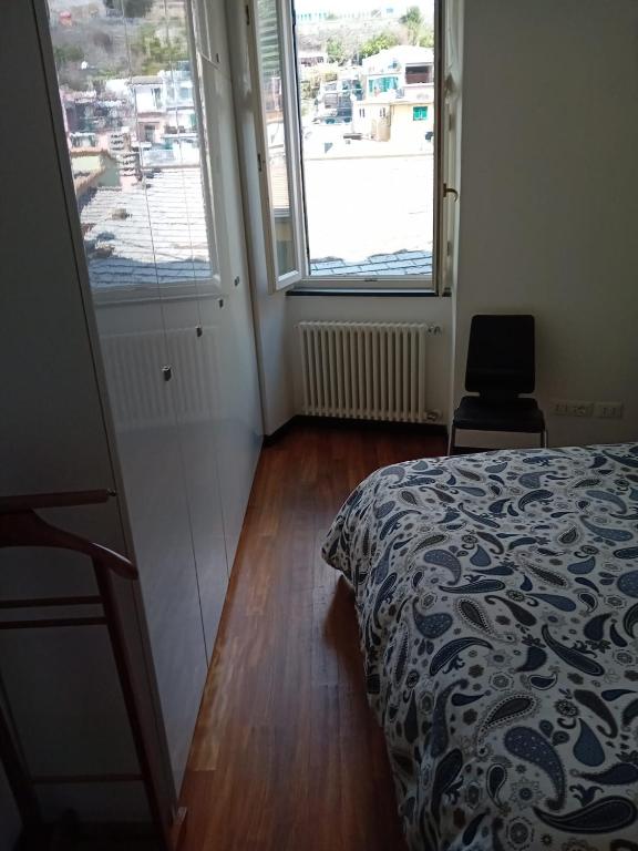 Postel nebo postele na pokoji v ubytování La Scala Vernazza CinqueTerre