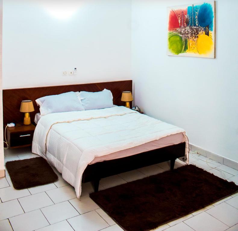 Ένα ή περισσότερα κρεβάτια σε δωμάτιο στο Appartement