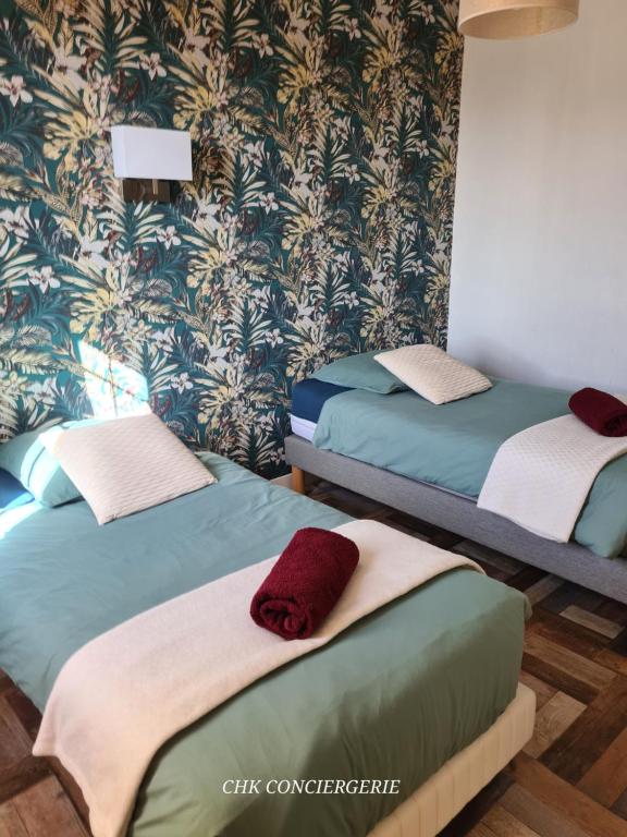 Posteľ alebo postele v izbe v ubytovaní Le Bocage gîte 90m2 chaleureux à 4 min du Puy du Fou