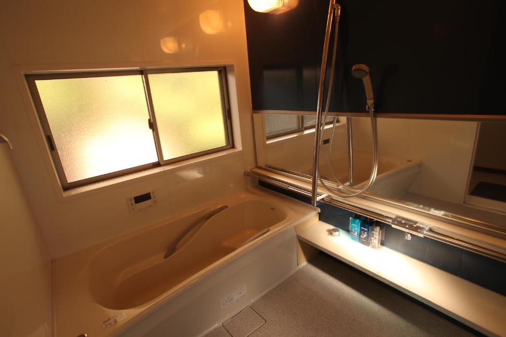 Koupelna v ubytování Guesthouse Usagi