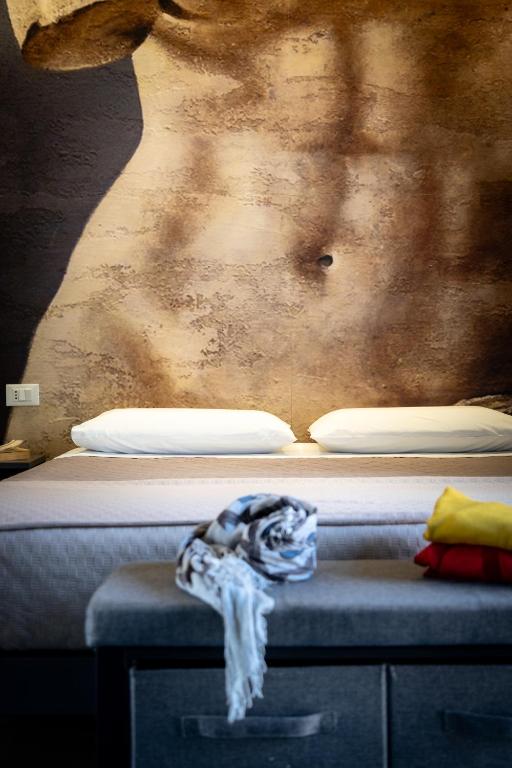 Postel nebo postele na pokoji v ubytování Dea's Rooms