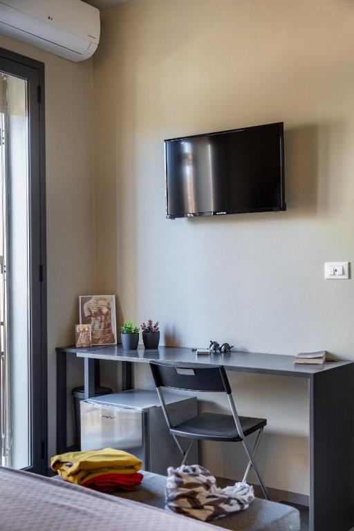 TV a/nebo společenská místnost v ubytování Dea's Rooms