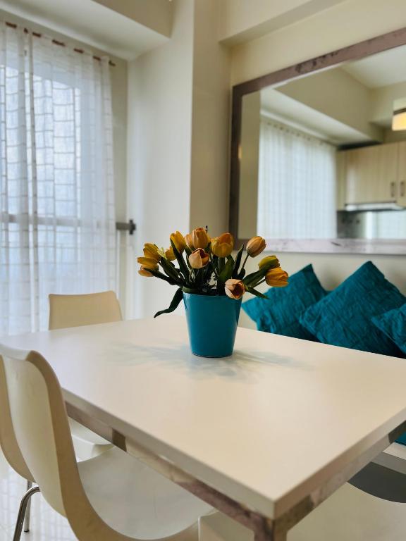 Posezení v ubytování Kim's Pad at SMDC Wind Residences