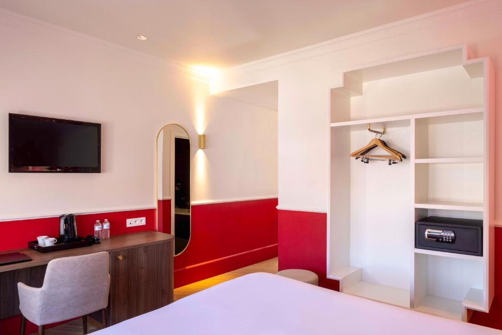 Postel nebo postele na pokoji v ubytování Hotel The Augustin