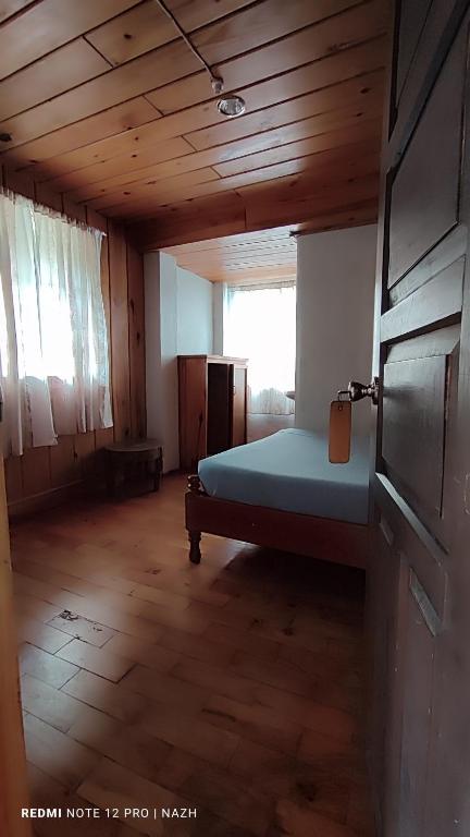 Postel nebo postele na pokoji v ubytování Saint Joseph Inn