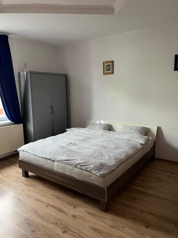 Postel nebo postele na pokoji v ubytování Rom Rems