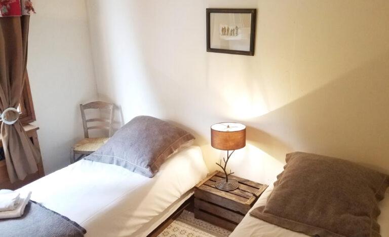 Postel nebo postele na pokoji v ubytování Chalet de Roselend