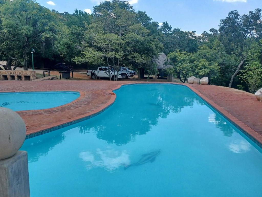 Bazén v ubytování African Bushveld 129A Bachelor Room nebo v jeho okolí
