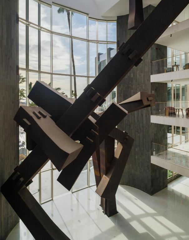 a large metal sculpture in a building at Plus Fariones Suite Hotel in Puerto del Carmen