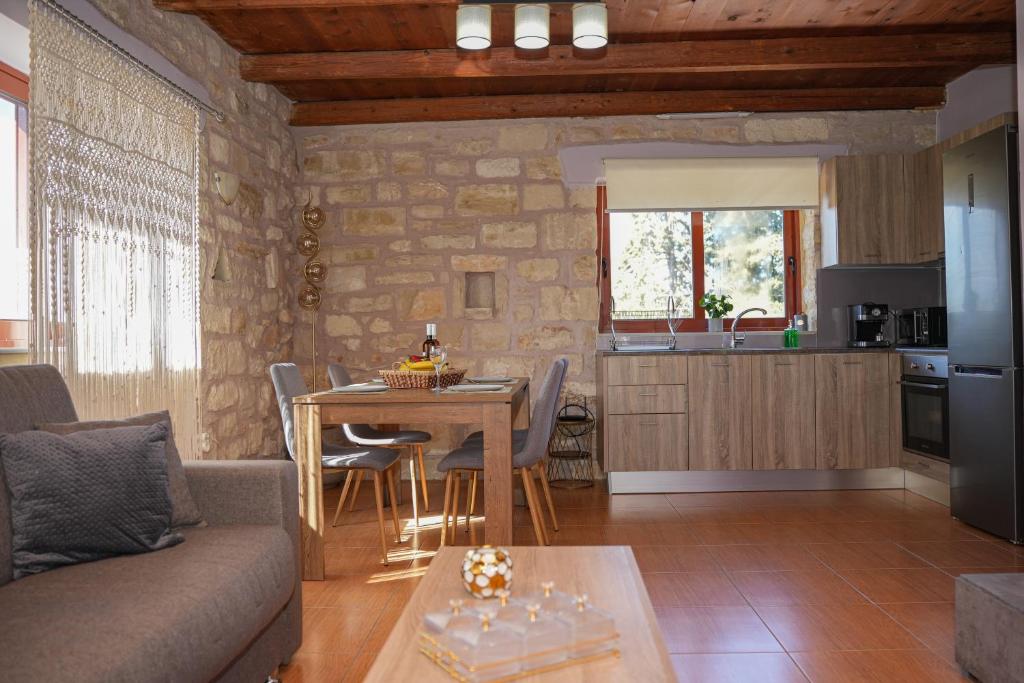 A kitchen or kitchenette at SundayMar Stone House