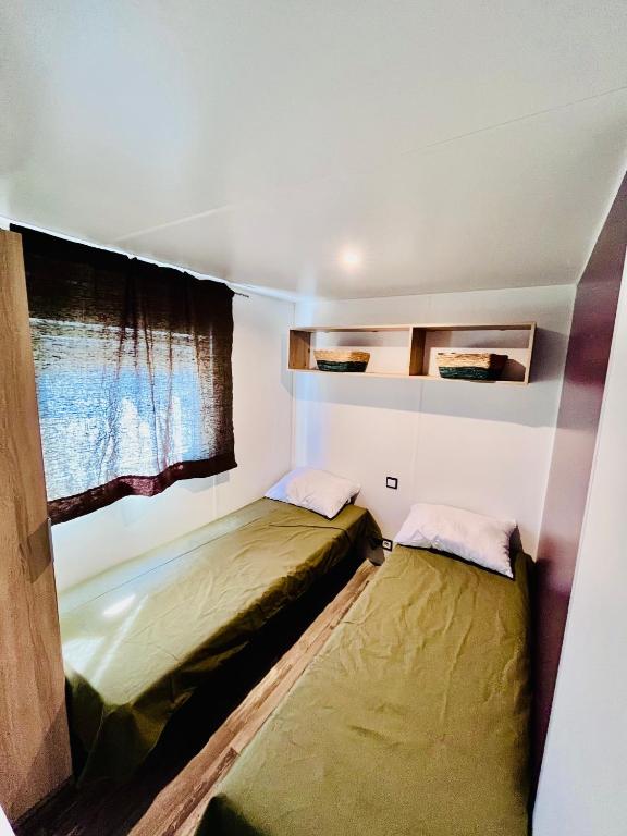 Postel nebo postele na pokoji v ubytování Spacieux mobile home premium