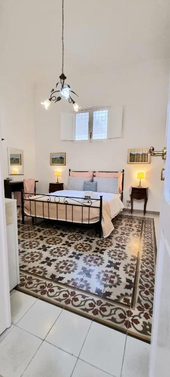 Postel nebo postele na pokoji v ubytování BnB '900 Lecce centro