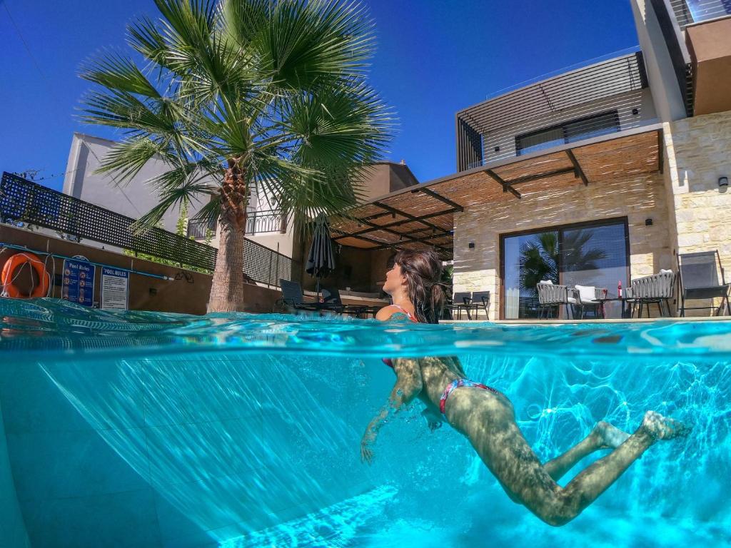 The swimming pool at or close to Almi-Cove Hilltop Villas