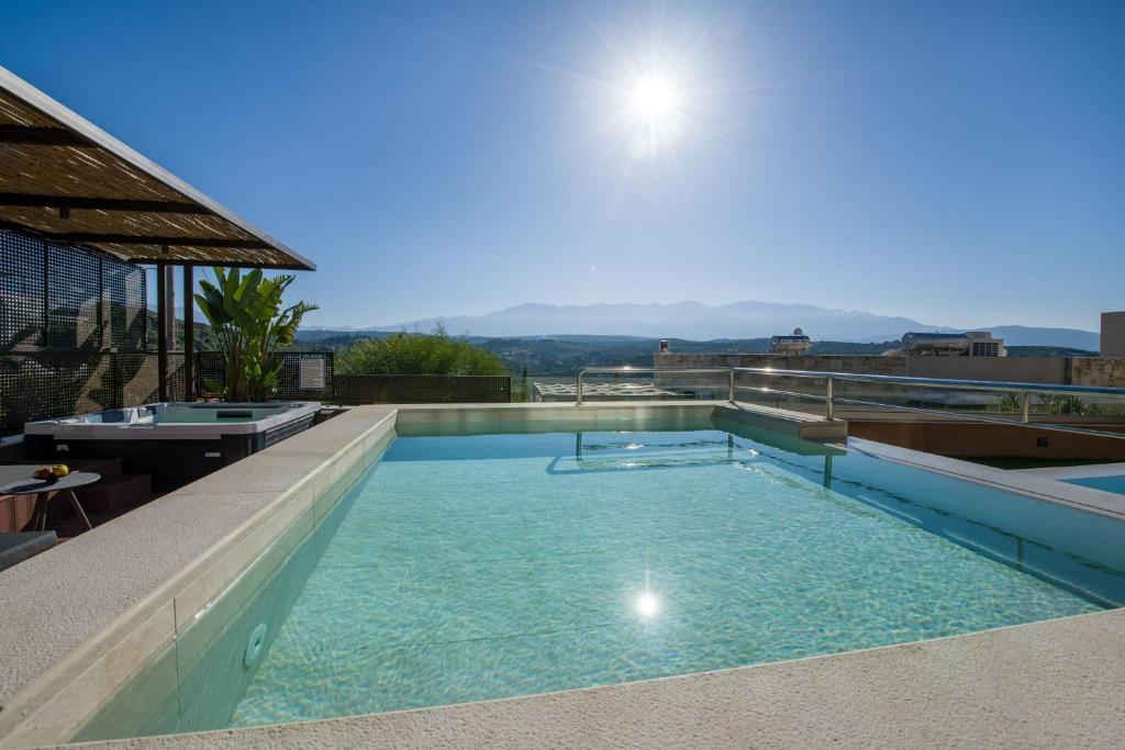 The swimming pool at or close to Almi-Cove Hilltop Villas