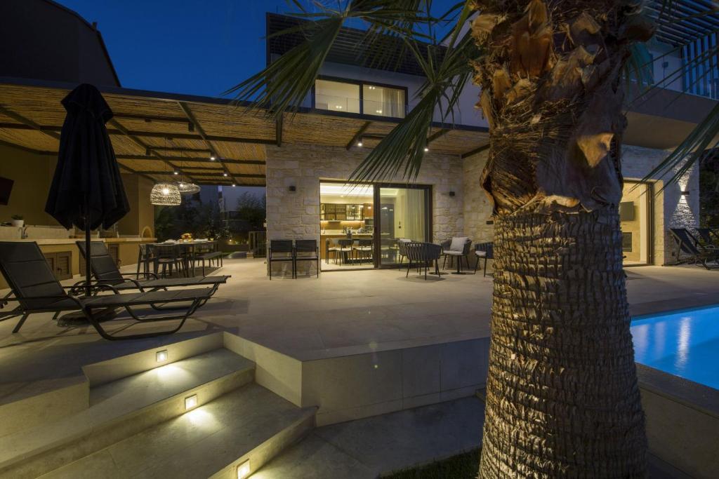 The swimming pool at or close to Almi-Cove Hilltop Villas