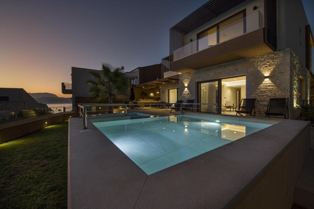 The swimming pool at or close to Almi-Cove Hilltop Villas