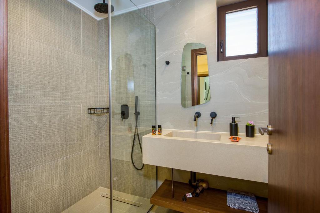 A bathroom at Almi-Cove Hilltop Villas