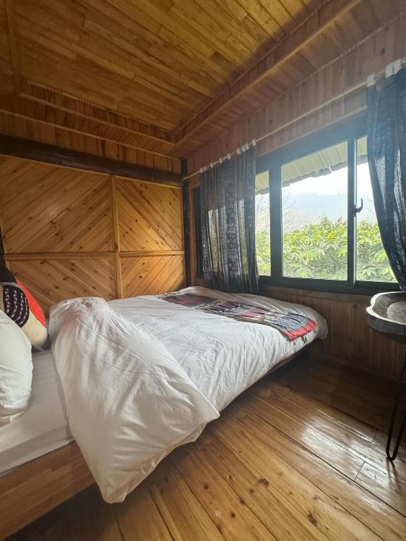 Giường trong phòng chung tại Muong Hoa - Sapa Retreat