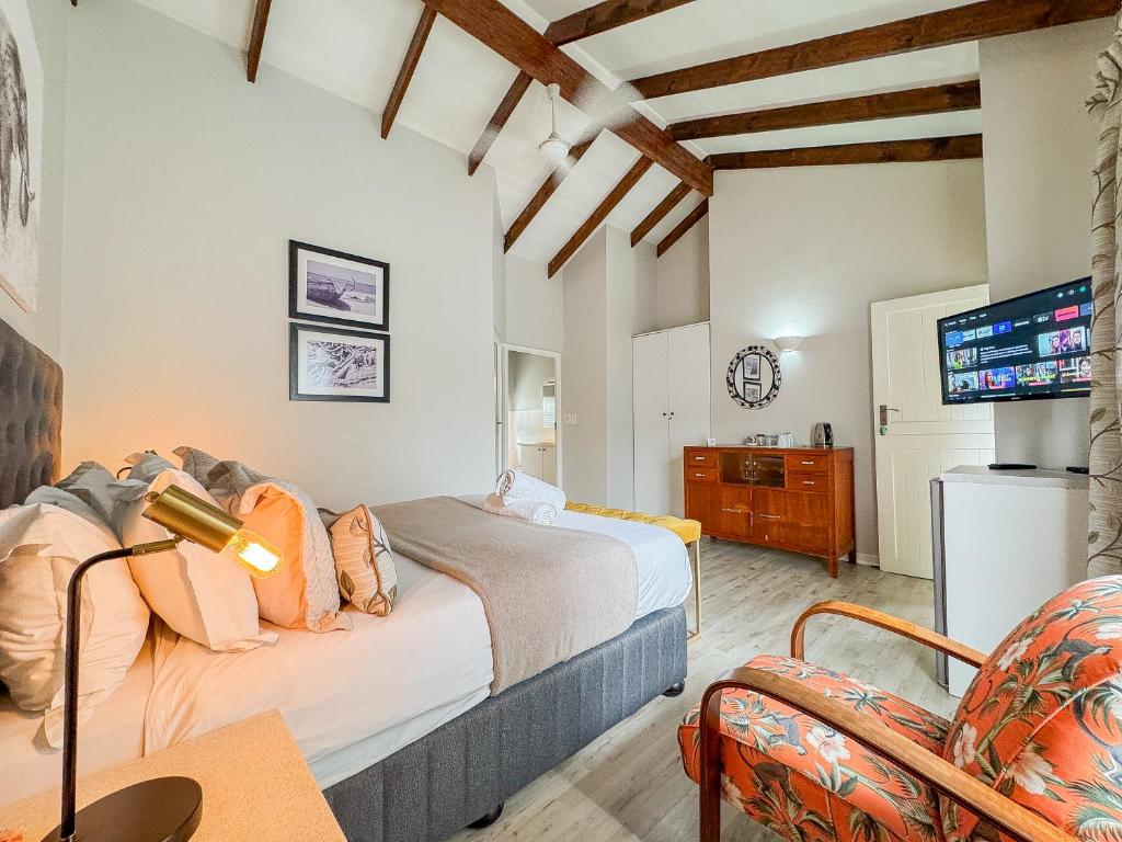Rúm í herbergi á Amoris Guesthouse Randburg II - Darrenwood