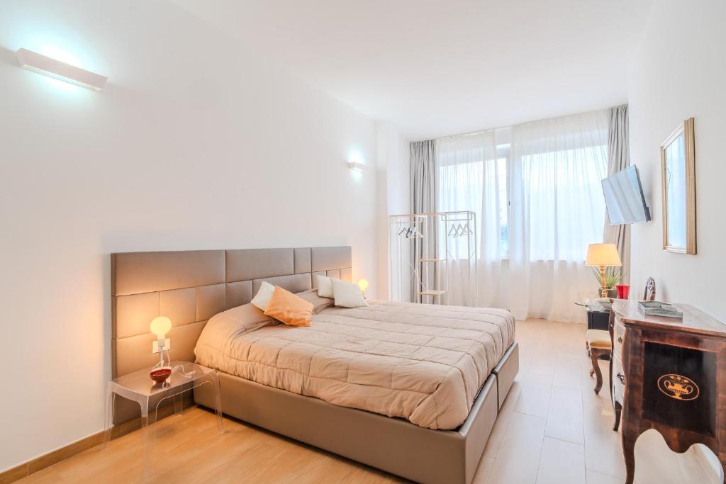 Postel nebo postele na pokoji v ubytování B&B Charme