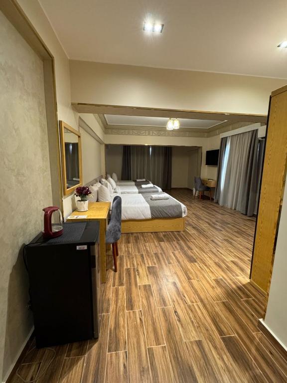Postel nebo postele na pokoji v ubytování Dyafa Pyramids Hotel & Spa