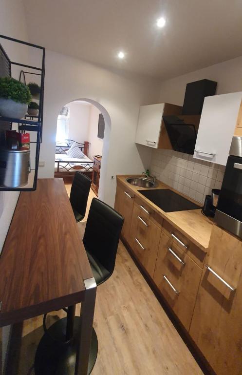 Kuchyň nebo kuchyňský kout v ubytování Pension Appartementhaus Central