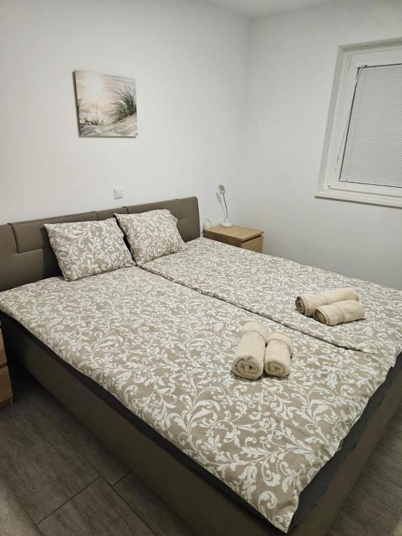 Postel nebo postele na pokoji v ubytování Apartma Zala