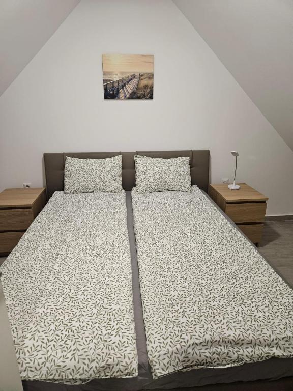 Postel nebo postele na pokoji v ubytování Apartma Zala