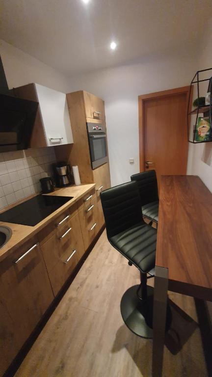Kuchyň nebo kuchyňský kout v ubytování Pension Appartementhaus Central