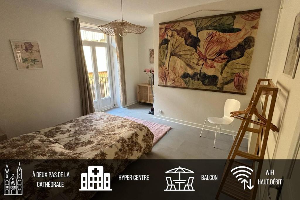 une chambre avec un lit et un tableau au mur dans l'établissement Cozy Center 2 Avenue des États-Unis, à Clermont-Ferrand