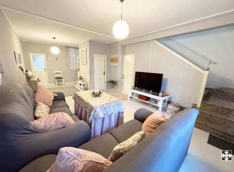 a living room with a couch and a table at La Casita de Ronda in Ronda