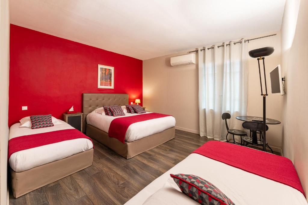 Postel nebo postele na pokoji v ubytování HOTEL ERMITAGE