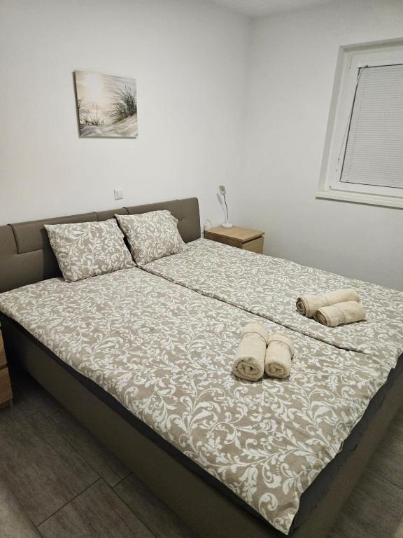Postel nebo postele na pokoji v ubytování Apartma Zala