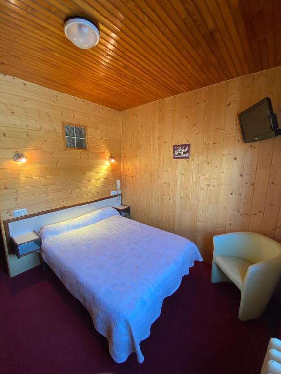 Postel nebo postele na pokoji v ubytování Relais du Belloch