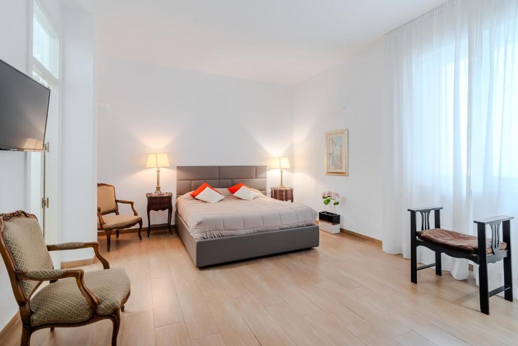 Postel nebo postele na pokoji v ubytování B&B Charme