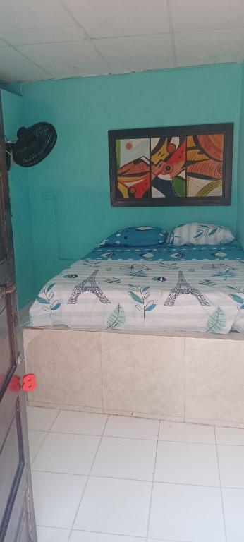 Letto o letti in una camera di Hostal Amanecer del Valle
