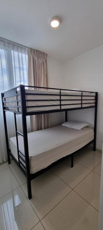Postel nebo postele na pokoji v ubytování River Cloud Apartment Shared