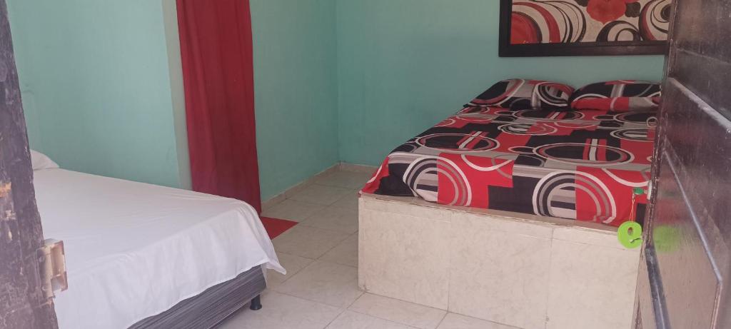 Letto o letti in una camera di Hostal Amanecer del Valle