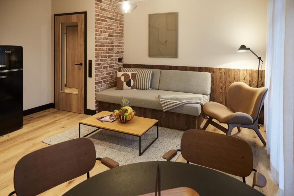 Khu vực ghế ngồi tại Binnendiek Haus 4 Comfort-Apartment 4