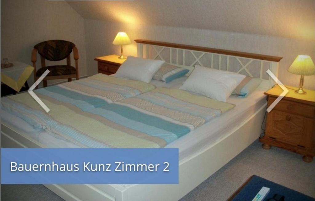 Postel nebo postele na pokoji v ubytování Bauernhauskunz