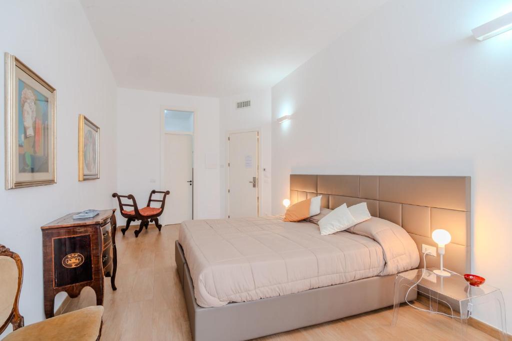 Postel nebo postele na pokoji v ubytování B&B Charme