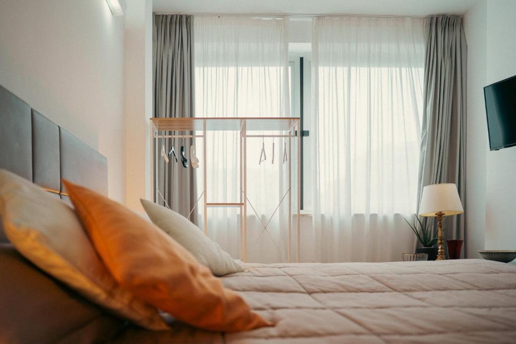 Postel nebo postele na pokoji v ubytování B&B Charme