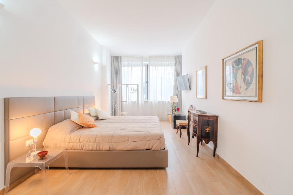 Postel nebo postele na pokoji v ubytování B&B Charme