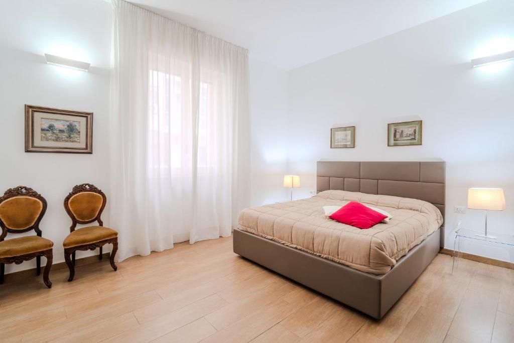 Postel nebo postele na pokoji v ubytování B&B Charme